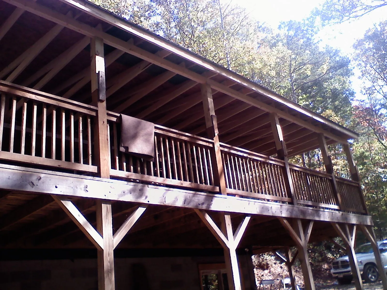 Timber framing under a new elevated porch and deck in Chapman